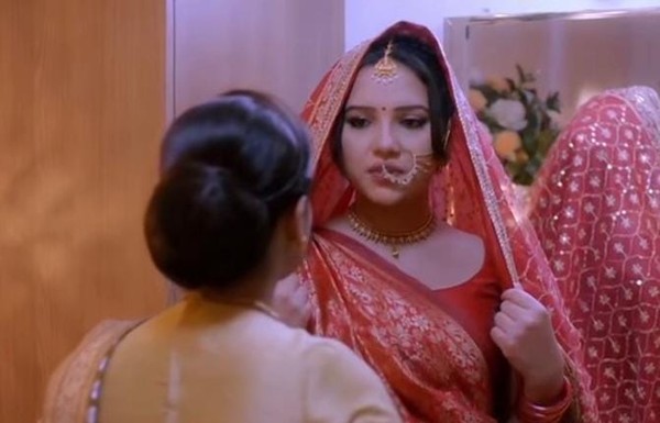 Vasudha: Vasudha in Bride’s costume and Dev as bridegroom marrying seen by Chandrika